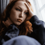 A woman deep in thought.