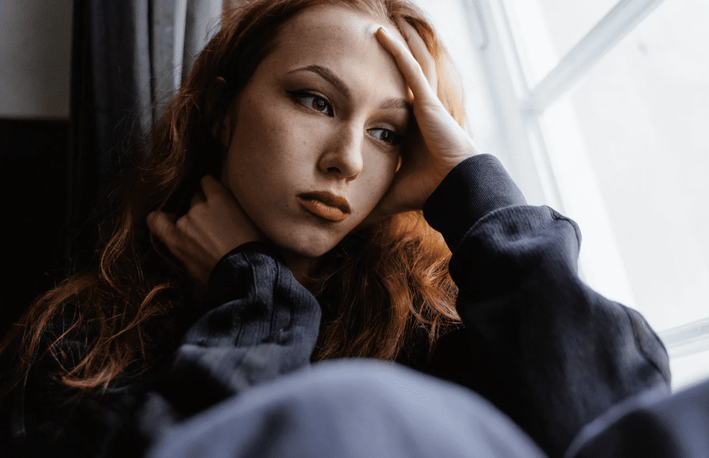 A woman deep in thought.