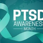 Teal awareness ribbon on a dark teal background with the text "PTSD Awareness Month" in bold white letters. The ribbon symbolizes support for PTSD awareness.