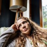 Sad mature woman contemplating at home